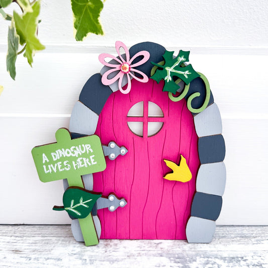 Pink Dinosaur Themed Magic Door, A Dinosaur Lives Here - Sweet Pea Wooden Creatons