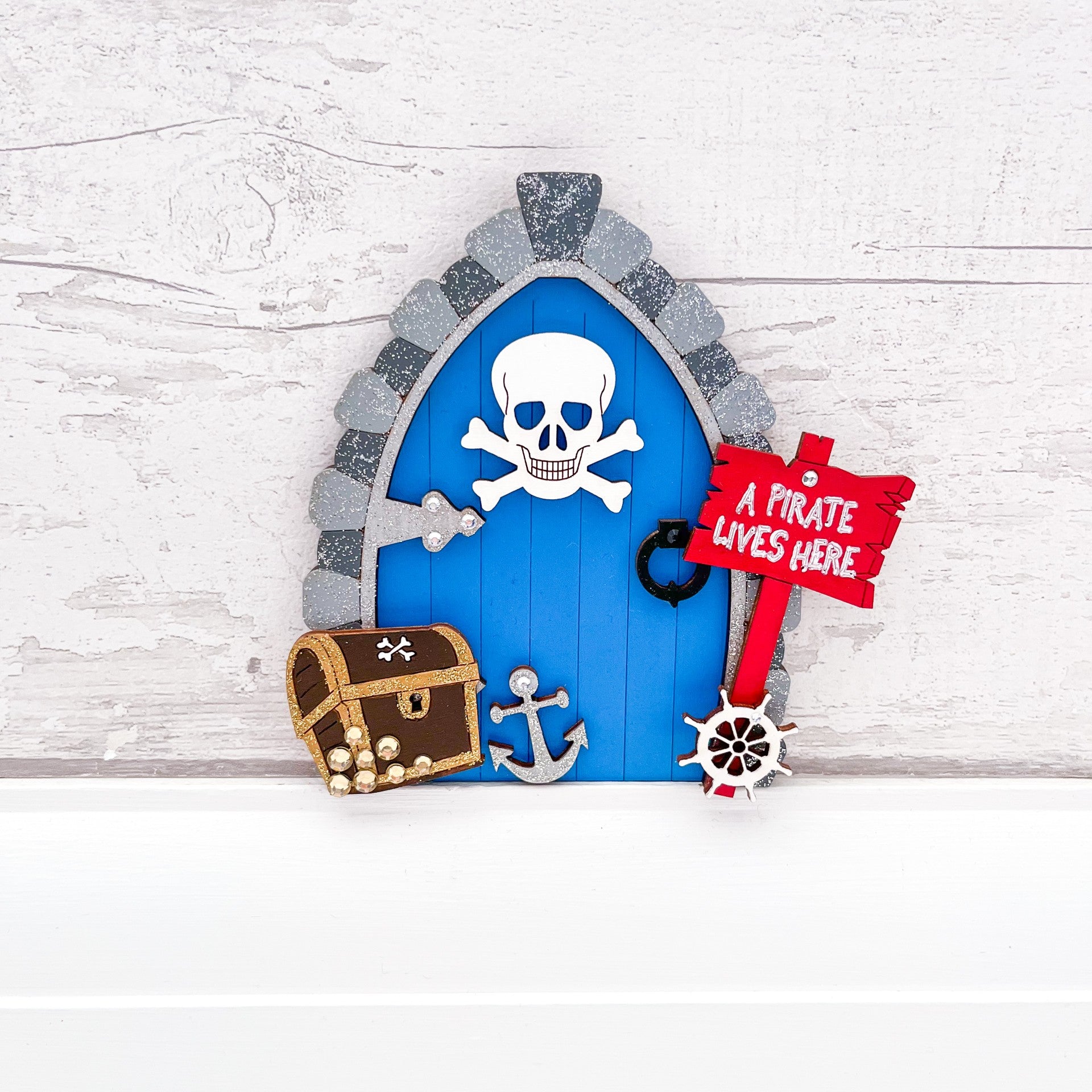 Magical pirate fairy door for kids, handcrafted to inspire imagination and open the gateway to thrilling adventures with fairies and pirates - Sweet Pea Wooden Creations