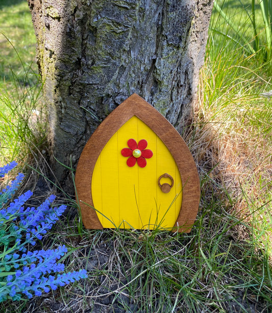 Beautiful Yellow Garden Fairy Door  Invite some fairy magic into your garden and capture your child’s imagination with this beautiful handmade wooden fairy door.