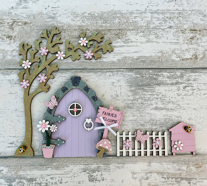 Beautiful Lilac & Pink Wooden Fairy Door Set  Invite some fairy magic into your home and capture your child’s imagination with this beautiful handmade wooden fairy door.