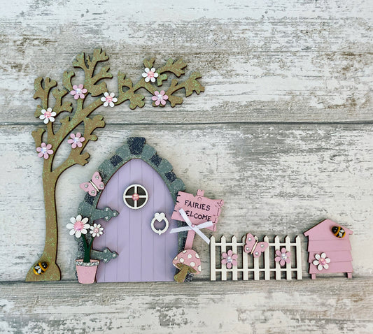 Beautiful Lilac & Pink Wooden Fairy Door Set  Invite some fairy magic into your home and capture your child’s imagination with this beautiful handmade wooden fairy door.