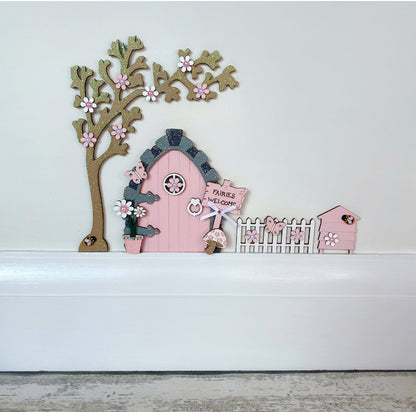 Beautiful Blush Pink Fairy Door Set with Blossom Tree, Fence & Beehive  Invite some fairy magic into your home and capture your child's imagination with this beautiful handmade wooden fairy door set.